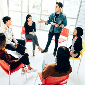 Group session for Resilience Circles programme with participants seated in a circle, engaging in discussion