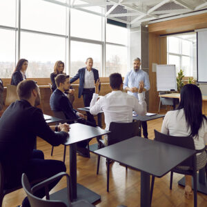 Employee Self Care Seminars with participants attending a seminar in a conference room