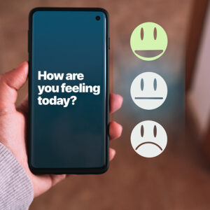 Mental Wellness Screening shown on a mobile phone with the question 'How are you feeling today?